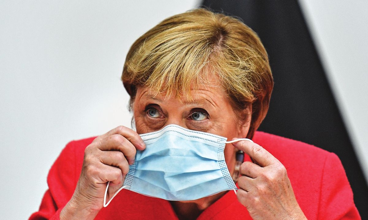 İki deputat istefa verdi:  Almaniyada maska qalmaqalı