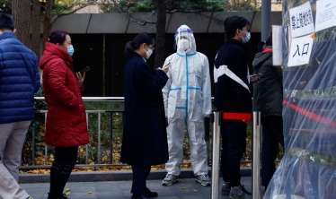 Çində koronavirus yenidən alovlandı -  Ticarət mərkəzləri, parklar bağlandı