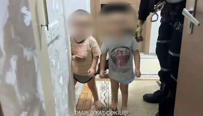 Bağlı qapı arxasında qalan azyaşlılar belə xilas edildi -  VİDEO