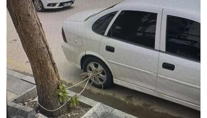 Seldən qorunmaq üçün  avtomobilini ağaca bağladı