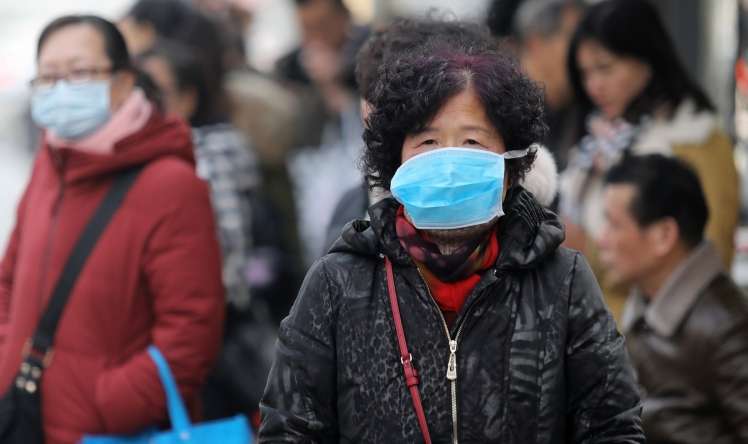 Çində daha 12 nəfərdə koronavirus aşkarlandı 
