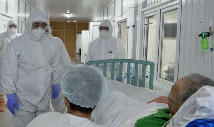 Qırğızıstan prezidenti ağır koronavirus xəstələrini ziyarət etdi 