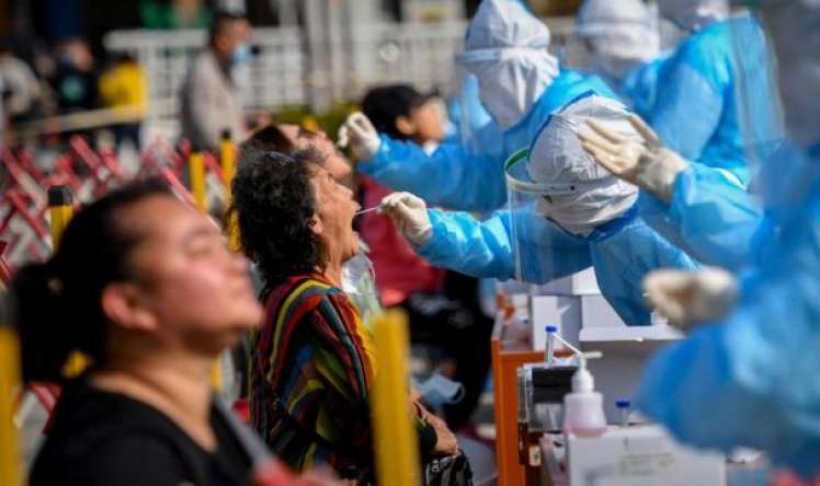 Çində pandemiya alovlanır -  Günə 25 min yoluxma