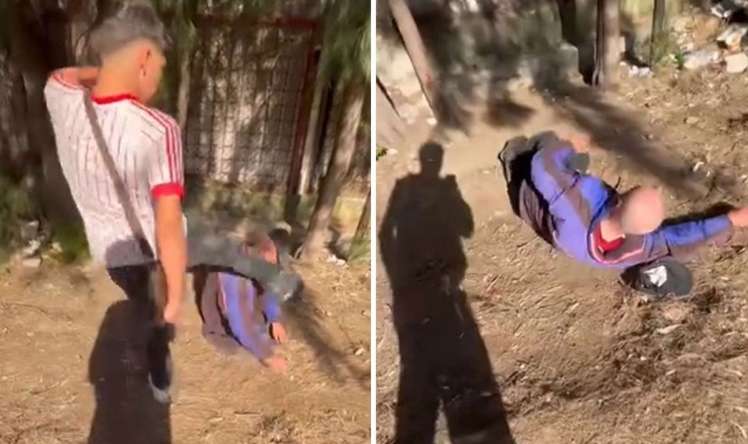 Küçədə yatan yaşlı kişini lağa qoyub,  təpiklədilər